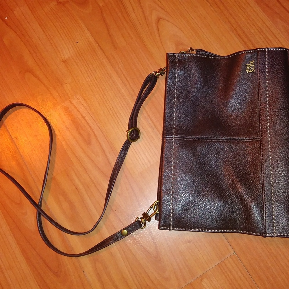 The Sak brand brown purse